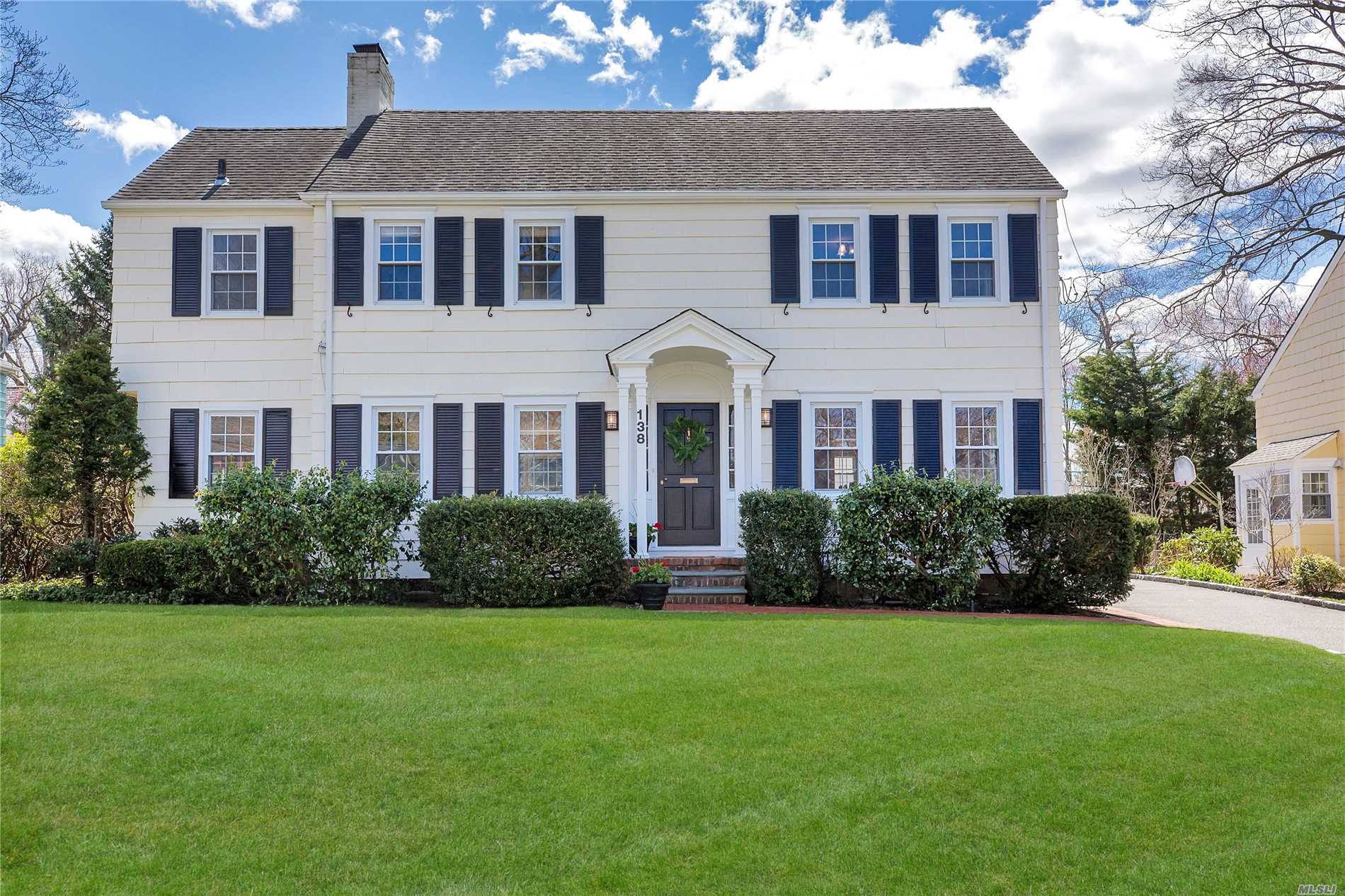 Classic Center Entry Colonial, Gourmet Kitchen, Elegant Living Room w/Fireplace, Formal Dining Room, Sunny Den With French Doors That Open To a Lovely Yard with patio, professionally landscaped property, Detached Garage, CAC, Wood Floors, Many Upgrades. Must See This Beautiful Home.