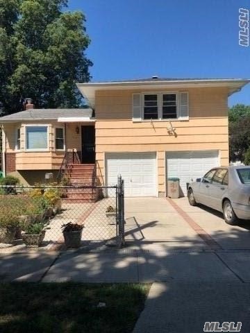 Beautiful Split Features 4 Bedrooms, 1.5 Baths, Lr, Fdr, Eik, Full Finished Basement, 2 Car Attached Garage, And Huge Lot! House Has Tremendous Potential! Great For A Large Family And Close To All!!!!