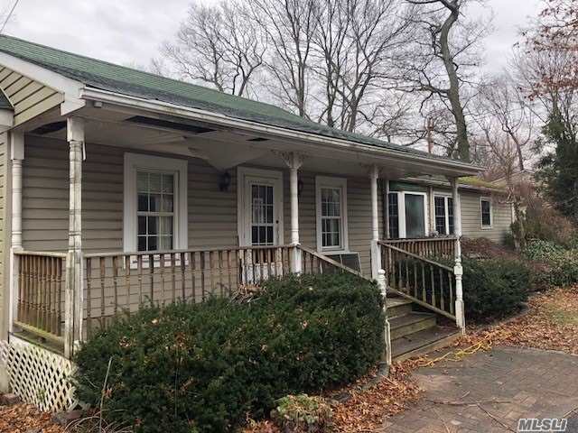 Charming Storybook Ranch W/Tons Of Potential! Home Boasts 3 Bedrooms, 1 Bth, Front Porch For Lazy Summer Days And Large Back Deck. Sold As Is. Subject To Investor Approval.