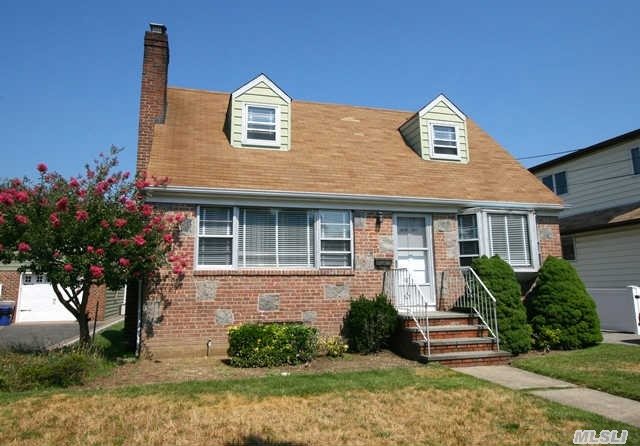 Perfect Starter Home! Bright And Sunny Cape With 3 Brs, 1.5 Bths, Hardwood Floors & Full Basement. Flat Backyard. Close To Guggenheim Elementary School