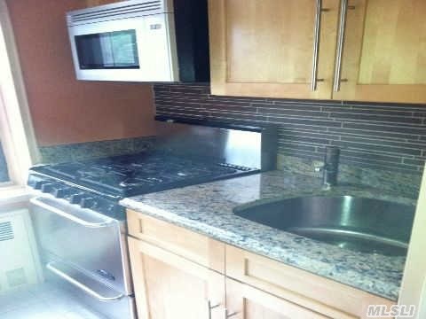 Designer Unit With Totally Custom Renovated Kitchen & Bathroom,  Separate Kitchen,  Stainless Steel Appliances,  Kohler Fixtures,  Granite Countertops,  Must See To Believe