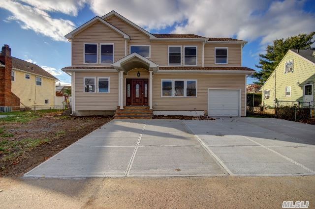 Newly Built 4 Br,  2.5 Bath Colonial. Spacious Rooms With Open Floor Plan. Eik W/Island,  Granite Counters W/Stone Backsplash. New Ss Appliances (Energy Star). Formal Dr,  Fr ,  Lr,  Master Bedroom,  Wic & Spa Bath. 3 Br's & Full Bath. Hard Wood Floors. Full Fin. Bsmet W/Tiels New Plumb.& Electric. Cac Gas Heating & Cooking.Fully Under Contract