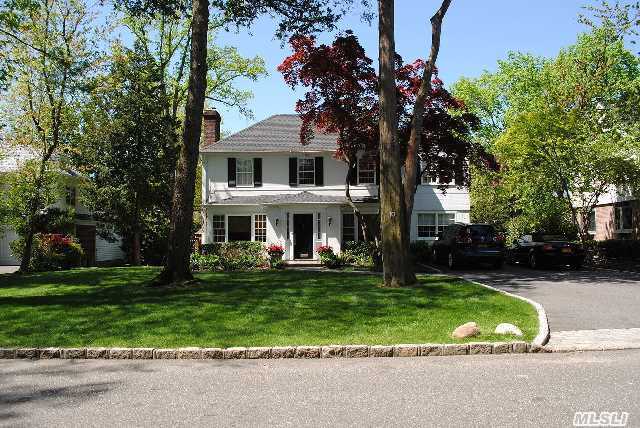 Meticulously Renovated And Beautifully Decorated Center Hall Colonial Perfectly Located In The Village Of Saddle Rock Estates. Formal Living And Dining Rm Den Kitchen Large Deck  New Baths Full Finished Bsmnt C/A Gas Heat New Roof, New Generator Professionally Landscaped Must See Bring Checkbook And A Toothbrush ! Your Home Awaits!