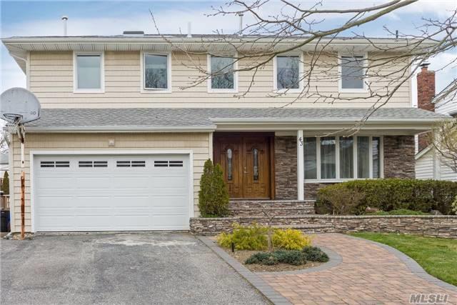 Gorgeous And Very Large Fully Redone 5 Bedroom Colonial With 3.5 Baths. Home Has New Electric, Plumbing, Sheetrock And Exterior. Kitchen Features Double Ovens, Double Sinks And Double Dishwashers. Full Height (Unfinished) Basement With French Drains. Must See!
