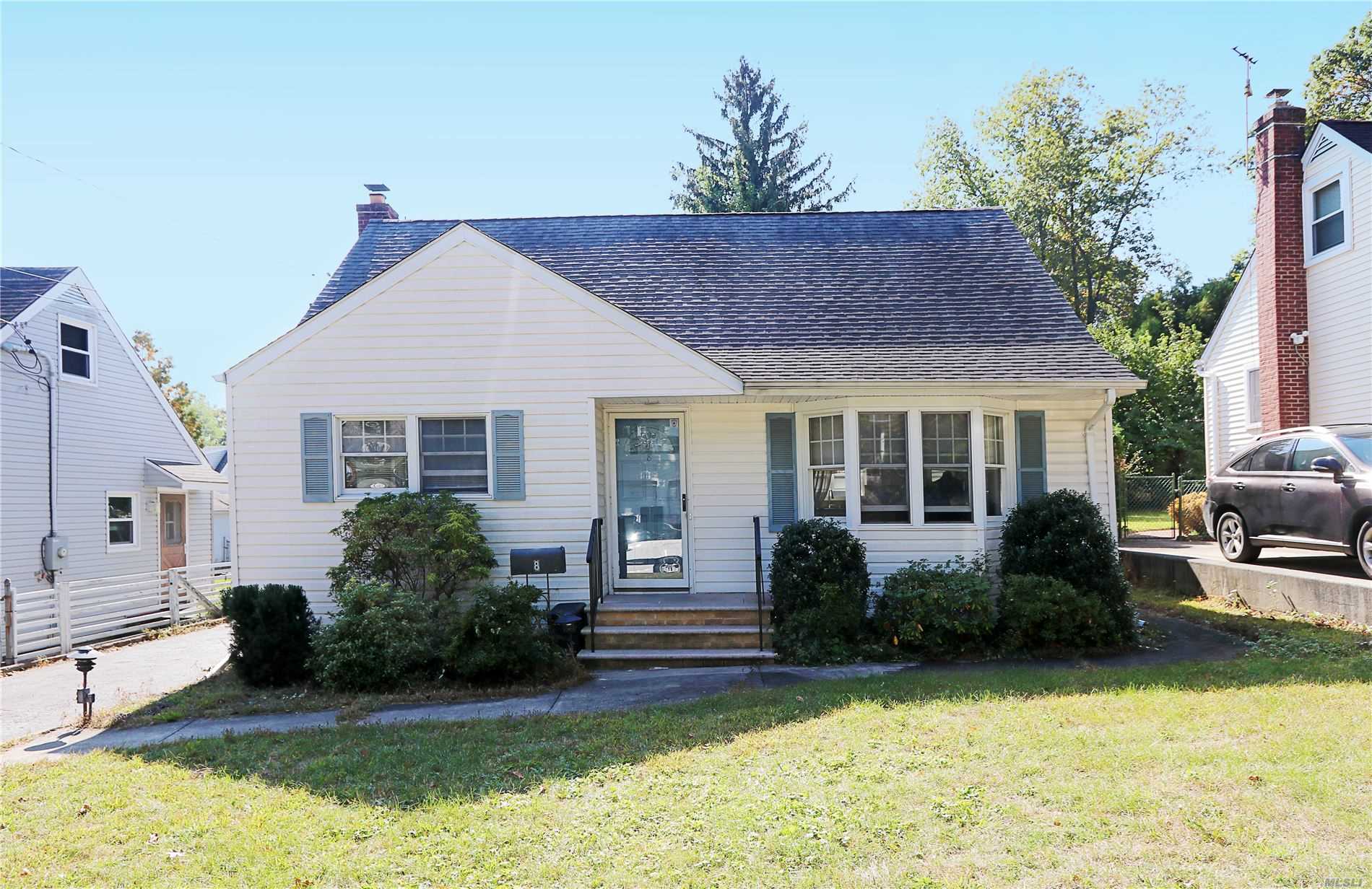 Cute 4 Br 2 Bth Cape Has A Full Second Floor Dormer For Spacious Rooms Plus Partially Finished Basement. Open Layout. New High-Efficiency Gas Boiler, New Full Bath on 1st Floor, New Gas Stove. Large Yard. Beach And Golf Course Rights. Close to LIRR, Restaurants, Shopping, Parks, Beaches.