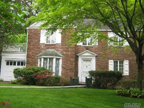 Charming Brick And Stucco 4 Bedroom, 3 Bath Colonial Set On Beautiful Property In The Desirable Neighborhood Of South Strathmore.