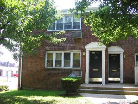 Upper Coner Unit With Lots Of Light. Crown Molding In Living/Dining Room. Updated Kitchen And Bath. New Kitchen Appliances. Polished Hardwood Floors. Washer/Dryer In Unit. Pull Down Stairs For Attic Access. 2 Stickers For Parking. Parking Behind The Unit. Pets Allowed. Walk To Alley Pond Park. Express Bus To Manhattan.