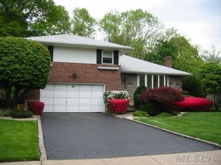 Meticulously Maintained 3 Bedroom Split On Perfect Midblock Location.  Lr W/ Marble Fireplace. House Sits On Oversized Lot W/ Georgeous Landscape, Beautiful Lighting, Paver Patio, Deck & Japanese Rock Garden. New Roof W/ Copper Flashing. Gutters & Leaders.  Updated 2.5 Baths, Finished Basement, 2 Car Garage W/Epoxy Floor. Alarm, Cac, And Igs, Syosset Schools.