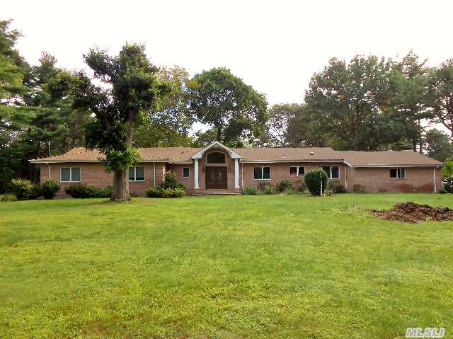 Beautiful Sprawling Brick Ranch On Two Flat And Cleared Brookville Acres.  New Kitchen And Baths,  All Hardwood Floors,  In-Ground Pool With Hot Tub.  Close To All.  Jericho Schools.