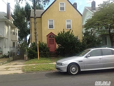 Spacious 2 Family House With Lots Of Potential. Zoning Allows 3 Family Conversions. Kitchens & Bathrooms Need Updates..Hardwood Floor Through Out..Prime Location And Very Close To Hillside Ave,  F Train Within 2 Blocks & Close To All Shopping,  Laundromats Etc.