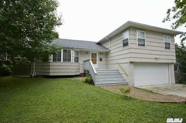 A Lovely Renovated Split Level In The Much Sought After Salem Area Of Port Washington.  Featuring A Eik,  Lr,  A Formal Dr,  3 Br,  2 New Baths,  Cac.  Hw Floors Thru-Out,  New Windows,  2 Car Garage,  A Large Famrm,  A Private Backyard And Patio. Convenient To Town And Lirr.