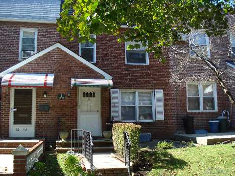 This Is A Well Maintaied Beautiful Attached  Brick One Family Townhouse Located In The Heart Of Bayside.  This Home Has 3 Spacious Bedrooms And 1.5 Bathroom With Opened And Bright Livingroom And Dining Area.  This Home Also Has An Attached Garage From The Back Of The House With The Community Driveway. First Time On The Market And Priced To Sell!! A Must See!!