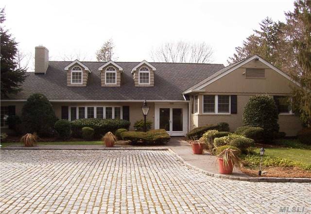 Enchanting Cobblestone Courtyard Welcomes You To This 5 Bedroom Jewel Set In The Heart Of Harbor Acres. Expansive Lr W/Fpl. Updated Gourmet Kitchen & Warm Den W/Bar Create A Wonderful Home For Entertaining. Recreation Room On Lower Level Opens To One Beautifully Landscaped Acre. House Generator, Heated Gutters& Leaders And More!