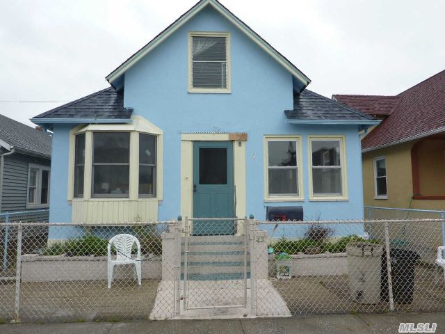 Spacious 2-Story Stucco Beach House Being Sold In 'As Is Condition' Beach Block Location And Steps To Beach. New Roof.