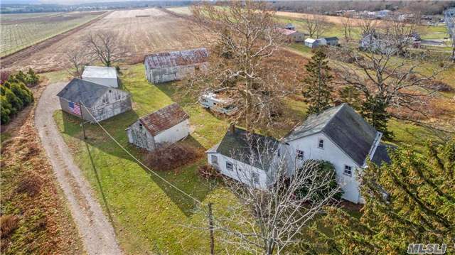 Historic House In Wine Country Needs Your Vision And Some Tlc To Return To Its Former Glory. Great Location Surrounded By Preserved Land Offering Expansive Vistas Of Long Island&rsquo;s Farming History. This Expansive Home And Outbuildings Offer Unique Flexibility For The Artist Or Craftsman In All Of Us.
