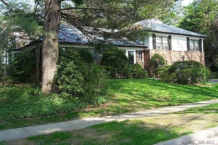 Spacious Brick Split Level Home Within Close Proximity To All. Large Formal Lr And Dr. Wonderful Lower Level Den With Fireplace