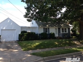 Nice Cape Cod-Mid Block Location-Great Starter Just Needs Your Loving Touch-Newer Roof And Heating System-Full Finished Basement With Bar-Newer Washer And Dryer-Nice Size Yard For Entertaining-Taxes Do Not Reflect Star Exemption