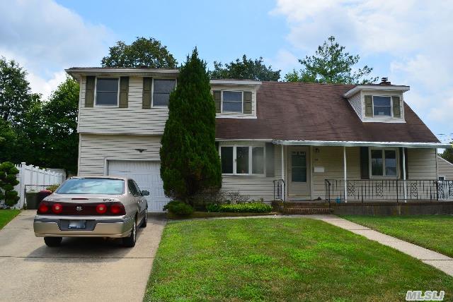 Very Spacious Layout With An Oversized Yard In Plainedge Schools; West Elementary.  Potential For Mother Daughter.  Within Walking Distance To Shopping,  Lirr,  Parks And Recreation.  Anderson Windows,  Wood Floors,  Tree Lined Street,  Large Bedrooms,  Great Opportunity!!