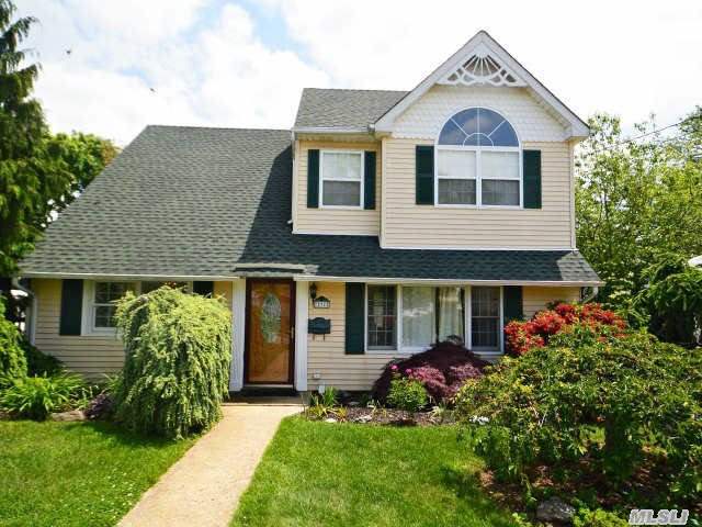 Pretty Expanded Cape With Architectural Details. Beautiful Custom Staircase Making Way For A Versatile Layout. New Kitchen W Granite, Ss Appliances, Bar Sink, Counter Height Dining, & Glass Display Cabinets. Fdr For Family Gatherings, Famiily Room Den/Office, Bth, Upstairs You Will Find Lg Master W Circle Top Window, Custom Closets, 2 Bedrooms, Upated Bth, Laundry Area