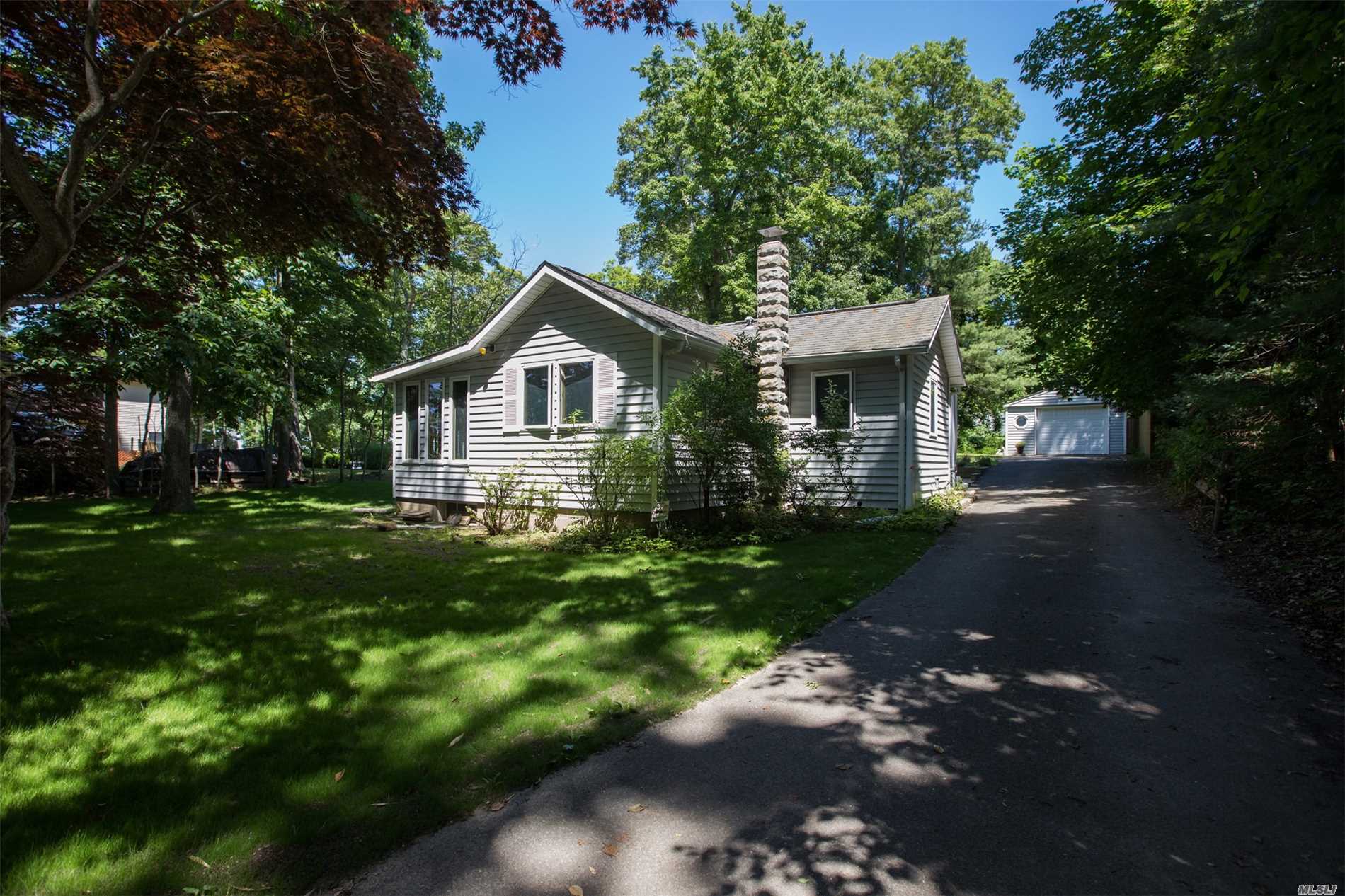 Perfect For Your Summer Retreat. Beautiful 2 Bedroom, 1 Bathroom Beach Cottage, Open Living Space With A Separate Den Area, Deck And Outdoor Shower. Steps To Bay Beach With Water Views From Your Window And Yard!