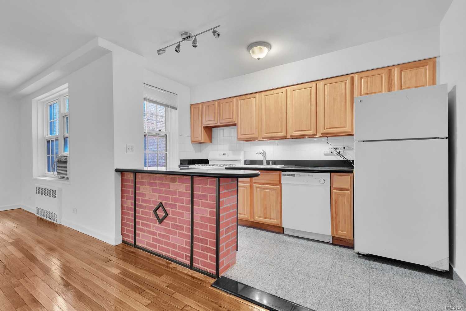 Pristine 2Br/1Ba In Close Proximity To F The Train. Nicely Polished Hardwood Floors, The Open Kitchen Features Granite Counter Tops, Dishwasher And A Breakfast Bar With Additional Storage. Windows In Every Room. Plenty Of Closets. Live In Super, Laundry In Building, Video Intercom, Wait List For Garage Parking.