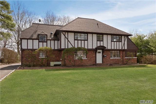 Sunlit 5 Bedroom Tudor Majestically Set On Sought After Street In Beacon Hill. Spacious Great Room With Hw Floors Flows Seamlessly To Open Concept Chef&rsquo;s Kitchen With Welcoming Center Island. 3 Full Baths. 2 Fireplaces. Beautiful Grounds W/ Slate Patio. Beach Rights. Convenient To Town And Lirr