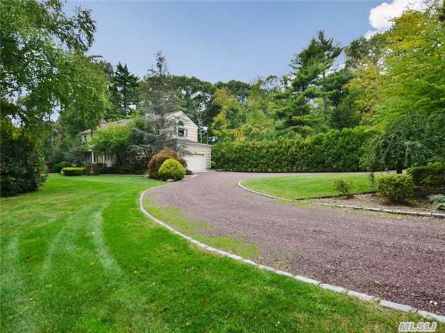 Classic And Bright! This Extended 4 Bedroom, 3.5 Bath Colonial Situated On 2 Flat Acres Boasts A Large Entry Hall, Large Eik W/Ose To Back Yard, Formal Liv. Rm, Formal Dining Rm, Family Room W. Vaulted Ceiling, Master Bedroom Suite W/Dressing Room W/His & Hers Closets, Vaulted Ceiling & Master Bath. Granite Patio, Gunite Pool, Gas Heat, Cac & More! Syosset Schools!