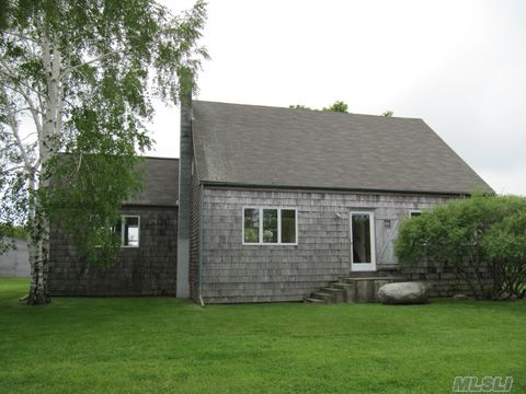 Orient Magic. Stylishly Renovated 4Br/2Ba Cape W/Bright Rooms On Estate-Like 2.03 Acres With Open Meadow, Mature Trees & Fruit Orchard. Kitchen W/Cathedral Ceilings & Beams & Sunroom. Double Living Room & Downstairs Bedroom Have Sliders To Back Deck. Hw Floors, Full Basement. Two Large Bedrooms & Bath Upstairs. Property Offers Incredible Privacy & Classic Orient Vistas.