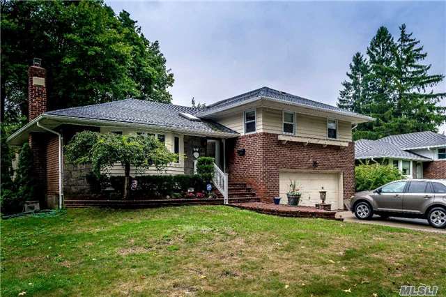 Charming 3 Bedroom, 2.5 Bath Split In The Carle Place Sd. This Home Boasts Beautiful An Open Floor Plane, Updated Kitchen, Wood Floors Throughout, Skylights, A Finished Basement, Central Heating And Cooling On A Large 76 X 125 Lot In An Exclusive Section Of Westbury. Will Not Last!