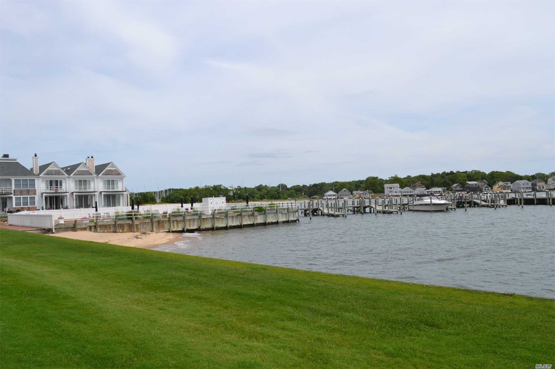Charming First Floor Unit. Beautiful Harbor And Bay Views , Deed Dock With Protected Marina. Heated In -Ground Pool Community Beach, Tennis And Islands End Golf Course Minutes Away. Perfectly Located In The Heart Of Greenport Village.