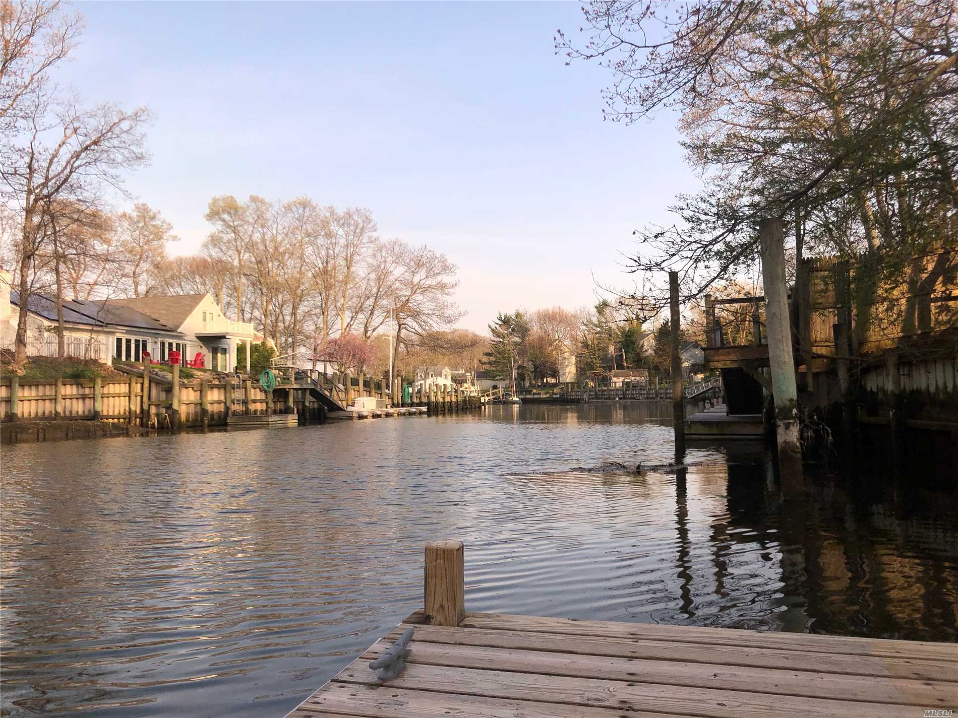 You Found Your Summer Getaway! Young Waterfront Colonial Built In 2002. 10&rsquo; Deep Water Docking On Fordam Canal. Will Accommodate A Large Boat, 100&rsquo; Frontage. Vacant --- Move Right In!. This Property Is Not Located Within A Flood Zone.