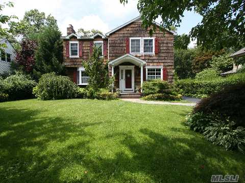 Bright & Sunny 4 Br. Center Hall Colonial. Large Lr W/Fpl. Dr W/Sliders To Large Flagstone Patio. Oversized Kitchen W/Breakfast Area. Family Room W/French Doors. Second Level Has Mbr W/Cathedral Ceiling And Spacious Master Bath. 3 Additional Bedrooms And Full Bath. Full Finished Basement, Garage. Beach Rights.