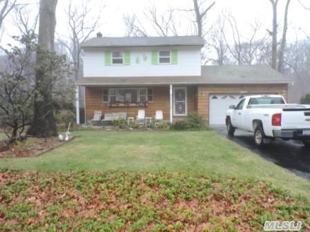 Wonderful Possibilities For This Woodland Estate Home. Bring Your Builders And Contractors For This Priced Under Market Value Investment. Hard Wood Floors,  Huge Den,  Great,  Just Shy 1/2 Acre Property,  In The Desirable Smithtown School District. Close To All.