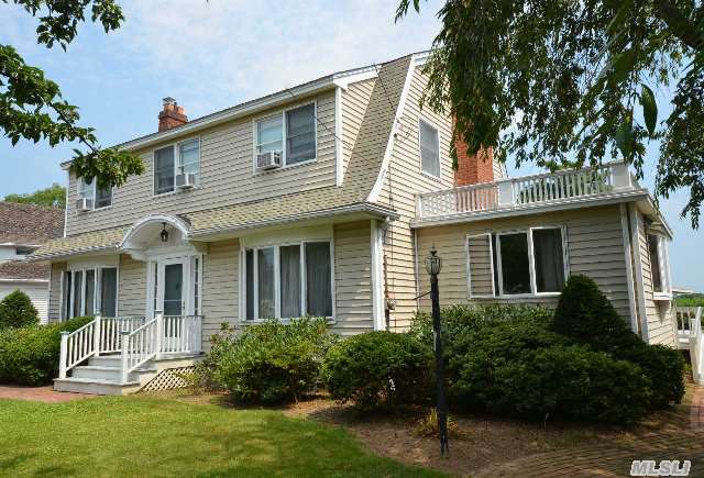 Country Dutch Colonial Located In The Heart Of Cutchogue.Separate Office And Entrance. Inground Pool,Classic Wood Details Throughout This Handsome Home.