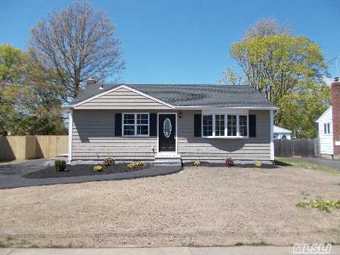 Completely Renovated April 2013! All New. New Siding With Cedar Impressions, New Windows, New Roof, New Driveway. Freshly Seeded Flat Lot. Inside Has Dark Walnut Hardwood Floors Throughout. Kitchen Features Custom Creme Cabinets With A Chocolate Glaze, Topped With Granite Counters And Stainless Steel Appliances. Bath Is All New And So Is Heating And Electical Systems.