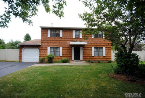 Spacious Center Hall Colonial On A Tree Lined Quiet Block, In Half Hollow Hills School District. Renovated Baths And Kitchen With Granite Countertops And New Appliances. New Boiler,New Floors, New Pvc Fence, New Shed, New Washer And Dryer. Inground Sprinkler, Security And Alarm System And Much Much More. A Must See For Property Lovers. 