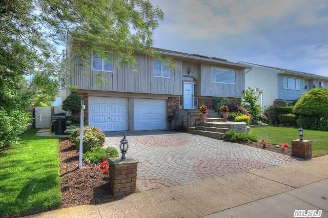 Open-Concept Kitchen-Livingrm-Diningrm In This 5-Bedrooms, 3-Bath Hi Ranch W/Views Of Beach & Bay. Granite Counters & Breakfast Bar, Stainless Steel Appliances, Farmhouse Sink. In Ground Pool. 2-Car Garage With Paving Stone Driveway.