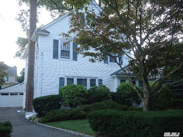 Lovely Colonial On Pretty Tree Lined Street. Enclosed Sun Filled Porch,  Living Room With Wood Burning Fireplace,  Dining Room And Expanded Eat-In-Kitchen Completes The First Floor. 3 Generous Sized Bedrooms,  1 Full Bath. Walk Up Attic. New Roof,  Gas Boiler. Spacious Backyard. Walk To All !!