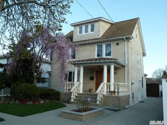 Beautifully Renovated Colonial Home Featuring 4 Bedrooms,  3 Bathrooms,  Hardwood And Marble Floors Throughout And Finished Basement. Spacious And Beautiful Back Yard W/ 2 Car Garage And Private Driveway. Near Mass Transit,  Major Highways,  And All. Absolutely Move-In Condition. A Must See!