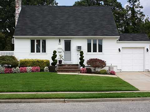 Meticulously Maintained Cape With Renovated Kitchen And Baths. Beautifully Landscaped With In Greound Sprinklers, Part Fin Bsmt And Outside Entrance. Great Value In Plainedge School District.