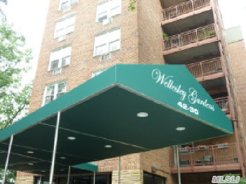 Spacious 2 Bedroom With Terrace! Same Block As Lirr. Restaurants,  Shopping,  P.S.98 All Nearby. 2 Blocks From Northern Blvd. Indoor/Outdoor Parking (Wait List/Additional Monthly Fee). Gym/Storage Avail,  Monthly Fee. Eligible For Membership To Douglas Manor Club  (Tennis,  Swimming,  Etc.)
