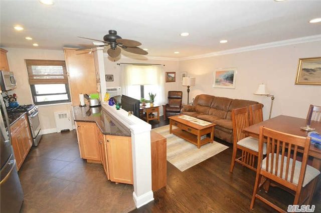 Top Of The Hill Ideal 2nd Fl 2 Br Open Floor Plan, Kit Wall Removed, Granite &New Stainless Appliances, 3 New A/C Units...All W/5Yr Warranty. In Wall, Mahogany Hwd Flrs, Crown Moldings Thruout, Recessed Lighting &Updated Elec, Minutes From Lirr. Garage(Storage), Olympic Pool, V Ball/B Ball, Dogrun, Playground, Bike Rm.