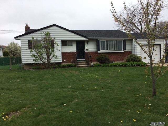 Very Nicely Situated Corner Property, Three Bdrm. Ranch W/Deep Set-Back, Over Quarter Acre, Attached Garage, Cac And Heating System And Roof 2013. New Gas Burner, Vinyl Siding, Sprinkler System, Full Basement, Updated Bath, Skylight, Fully Fenced Backyard, Minutes To All Parkways.