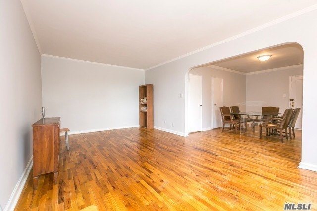 Great Neck Plaza Top Floor Unit. Spacious Living Room & Dining Area. Near LIRR, Parks Town & Shopping. Super on Premises, Private Storage Bin. 2 Cats Allowed. Heat, Gas & Water Included