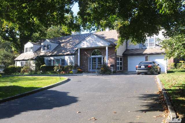 Beautiful & Serene Renovated Colonial Set Majestically Just Shy 1/2 Acre In Flower Hill. Great Entertaining & Family Home. Spacious & Airy Front Conservatory Foyer Leads To French Doors Which Open To Heated Pool & Grounds. Lr W/Fpl,  Dr,  Updated Kit.W/Island,  Fam. Rm. Br & Full Bath. 2nd Flr. Includes Open Landing Which Is Very Versatile. Cac. Much More !!