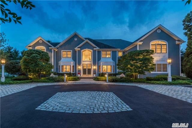 Entertainers Delight! Picture Perfect 6, 100Sqft, 6Bd, 7.5Ba Colonial Set On 2.46-Acres. Complete W/Mahogany Library, Wood-Burning Fireplace, Gourmet Kitch, Open Floor Plan, Guest Wing, Gym&Amazing Home Theater.Resort-Style Living, Backyard W/Brazilian Decking, Built-In Bbq, Inground Pool, Hot Tub & Tennis Court. Deck & Patio Overlook The Tranquil Property.
