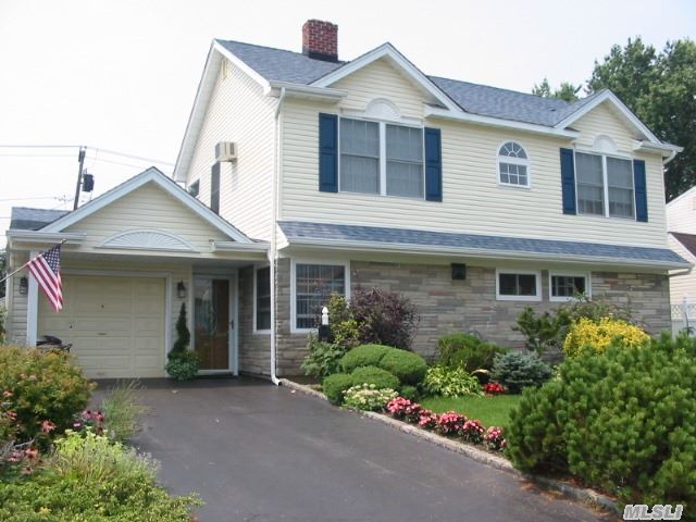 This Beautiful Full Dormer Colonial Faces East And Was Fully Dormered 2006 , Features Formal Dining Room , Formal Living Room,  Large E.I.K. 4- Bedrooms , Den, 2 Full Bath Rooms, , Full Attic With Steps, Large Pvt.Fenced Back Yard, 1 Car Att. Garage. School District # 17 Hicksville,  Must See!!!