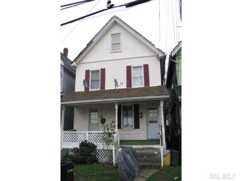 Investors Dream Home! Legal 2 Family, 2 Bed/1 Full Bath Over 2 Bed/1 Full Bath.  Steps Away From Lirr, Beach, Town, Worship. Perfect Rental/Investment Property.