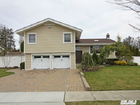 Beautifully Renovated Split Level. Custom Eat In Kitchen W/Wood Cabinetry, Granite Counters & Sky-Lite. Mstr Br W/Designer Bth, 4th Br/Office W/Full Spa Bath (Tumbled Marble, Steam Shwr). Country Club Backyard W/Htd Gunite Igp, Thermo Hot Tub, Play Gym For Kids, Trex Deck, Brick Paved Driveway & Patio. 500 Gal. Gas Tank For Pool. Anderson Windows. Hdwd Flrs Thru-Out.