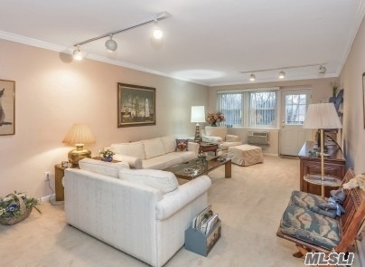 Extraordinarily Large And Sunny Two Bedroom Unit In Pristine Condition. Totally Updated Kitchen And Baths. Terrace Overlooks Pool And Entry. Large Master With Walk In Closet And Bath. Fully Carpeted. Plenty Of Closets Throughout. Close To Shopping, Lirr And Bus Transportation. Glen Cove Offers Beaches And A Public Golf Course. Move Right In!